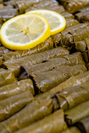 Grape leaves with parsley and lemons called Dolma , made from vines with rice, meat and...