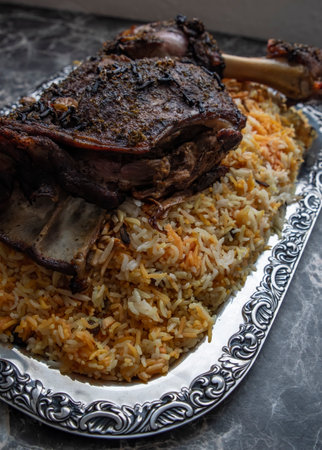 Grilled lamb Lamb shoulder ,on durum wheat or Freekeh or farik  with rice and nutsの写真素材