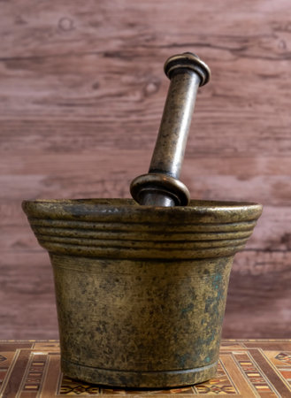 Metal Mortar for pounding weeds in pharmaceutical labors.の写真素材