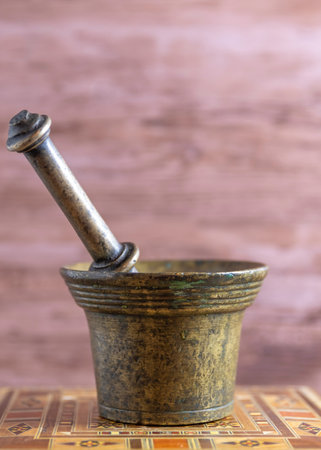 Metal Mortar for pounding weeds in pharmaceutical labors.の写真素材