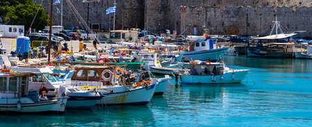 12.04.2022 fishing boats in Kolona Harbor, the second biggest commercial harbor on the island in Rhodes Greece.のeditorial素材