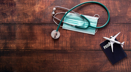 Migrant Doctor or Healthcare person , Passport and toy planeの写真素材