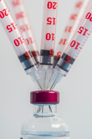 Insulin injection syringe in one injection solution bottle.の写真素材