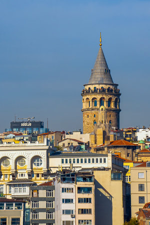 Galata tower at day Harborside EminÃ¶nÃ¼. Cityscape of a part of Istanbul city.のeditorial素材