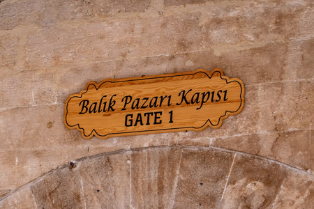 The wooden sign of the old fish market gate in istanbul called balik pazari kapisi in istanbul .のeditorial素材
