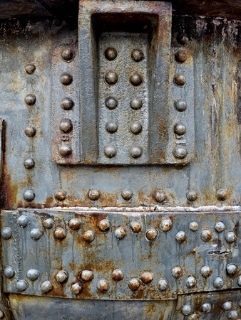 Large size bolts and nuts in old vintage rusty metal
