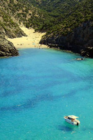 A boat suspended on a trasparent seaの写真素材