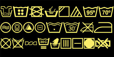 Set of simple geometric shapes in yellow colors on a black background.のイラスト素材
