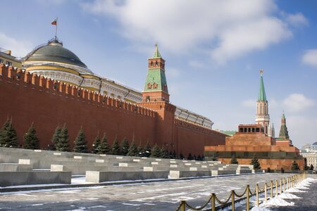 The red Kremlin wall and Lenin mausoleum in Moscow in winter, Russia