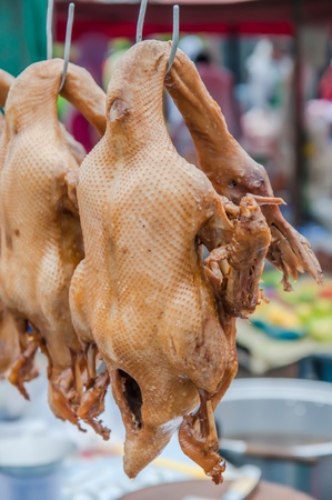 Pot stewed duck on sale in marketの写真素材