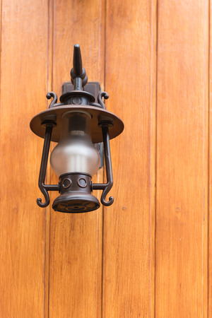 lamp on wooden wallの写真素材