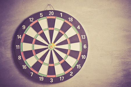 Target aim, symbol of goal and objective over gray background, business conceptの写真素材