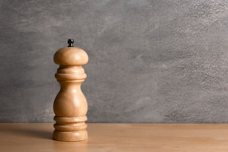 pepper wood bottle on wood tableの写真素材