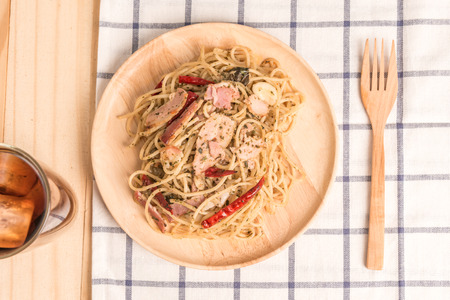 Ham chilies spaghetti with drinkの写真素材