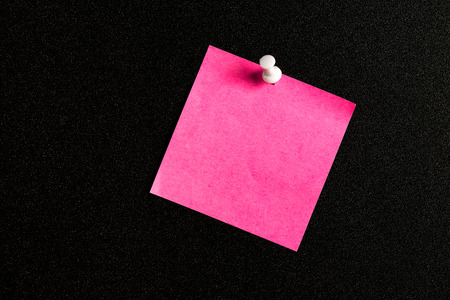 sticky notes with pin on a blackboardの写真素材
