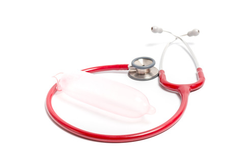 sexual health care concept , Stethoscope and condomの写真素材