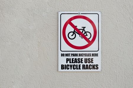 sign do not park bicycles here, Please use bicycle racksの写真素材