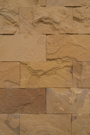 Background of old stone wall textureの写真素材