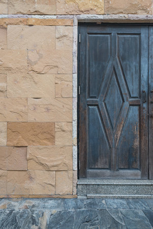 wood door in old stone house
