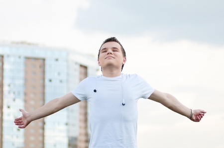Portrait of young attractive man, outdoorsの写真素材