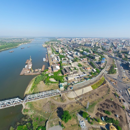 Aerial city view with crossroads, roads, houses, parks, parking lots, bridgesの写真素材