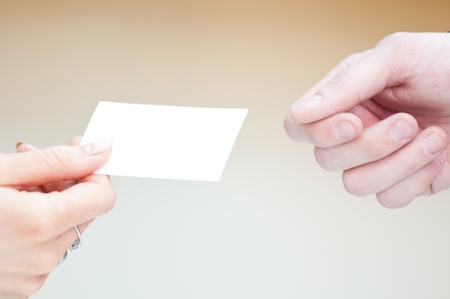 Concept shot of exchange business card between man and  woman. Partnershipの写真素材