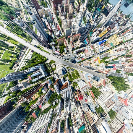 Aerial city view with roads, houses and buildings.の写真素材