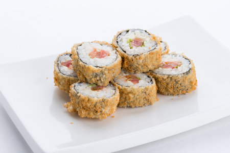 Sushi set and composition at white background. Japanese food restaurant, sushi maki gunkan roll plate or platter set.の写真素材
