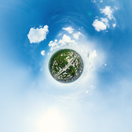 Aerial city view with crossroads and roads, houses, buildings, parks and parking lots, bridges....
