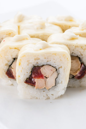 Sushi set and composition at white background. Japanese food restaurant, sushi maki gunkan roll plate or platter set.の写真素材