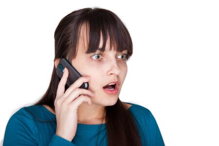 Attractive young woman talking on cellphone.の写真素材