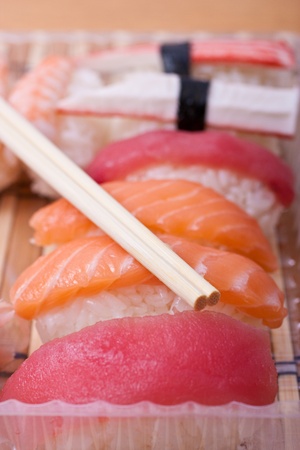 Sushi set of cups and chopstick. Selective focus.の写真素材