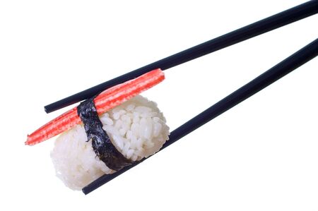 Single sushi on white. Artistic selective focus.の写真素材