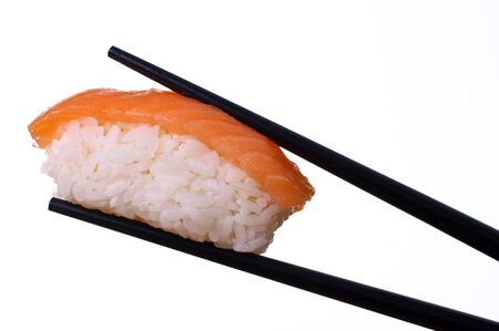 Single sushi on white. Artistic selective focus.の写真素材