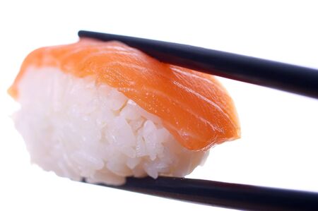 Single sushi on white. Artistic selective focus.の写真素材