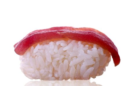 Single sushi on white. Artistic selective focus.の写真素材