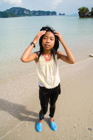 Small Little Girl play with  the sea during the  beach at  peipei island.のeditorial素材