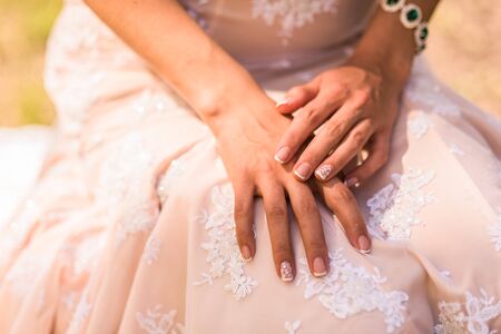 wedding manicure bride in gown, emerald jewelry braceletの写真素材