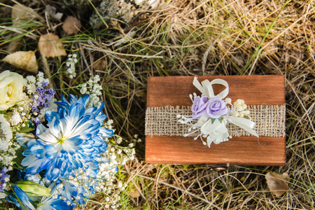 wedding ring pillow burlap in wooden boxの写真素材