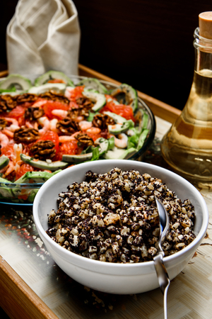 boiled rice with raisins and honey with oil and saladの写真素材