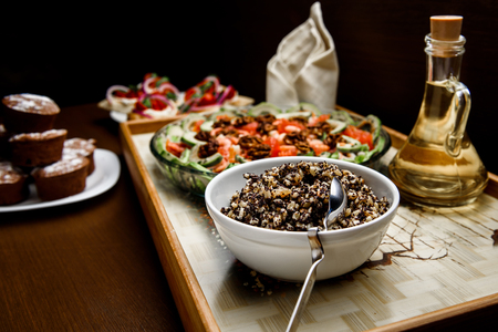 boiled rice with raisins and honey with oil and saladの写真素材