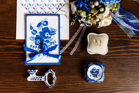 wedding accessories in the style of Gzhel, porcelain, flowers, rings, invitations, weddingの写真素材