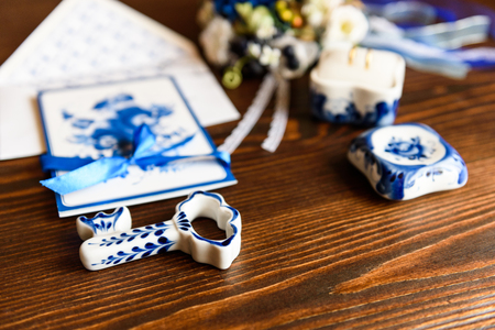 wedding accessories in the style of Gzhel, porcelain, flowers, rings, invitations, weddingの写真素材