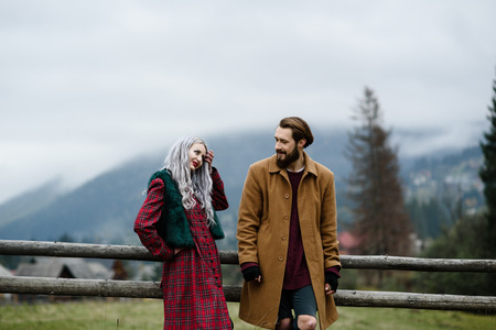 pair of lovers in the Carpathian mountains in national costumesの写真素材