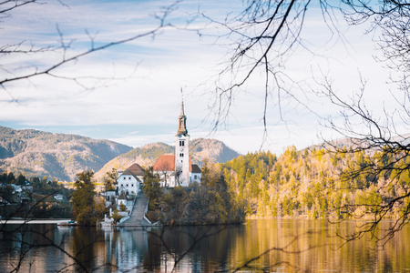 Lake Bled in the Alpine mountains in autumn under blue skyのeditorial素材