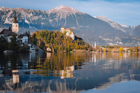 Lake Bled in the Alpine mountains in autumn under blue skyのeditorial素材