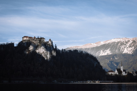 Lake Bled in the Alpine mountains in autumn under blue skyのeditorial素材