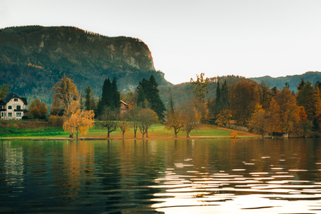 Lake Bled in the Alpine mountains in autumn under blue skyのeditorial素材