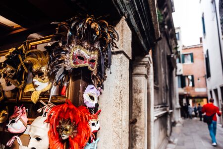 Venetian shop window with masks and sovereignsの写真素材