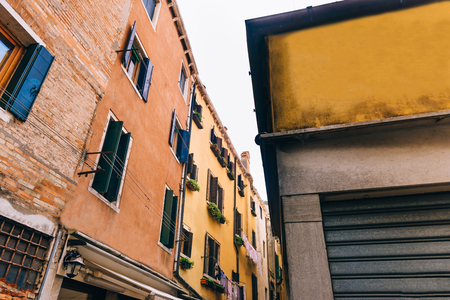 tourist routes of the old Venice streets of Italyの写真素材